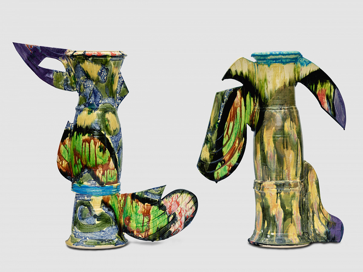 Two vases standing side by side, painted in colorful, rather muted colors