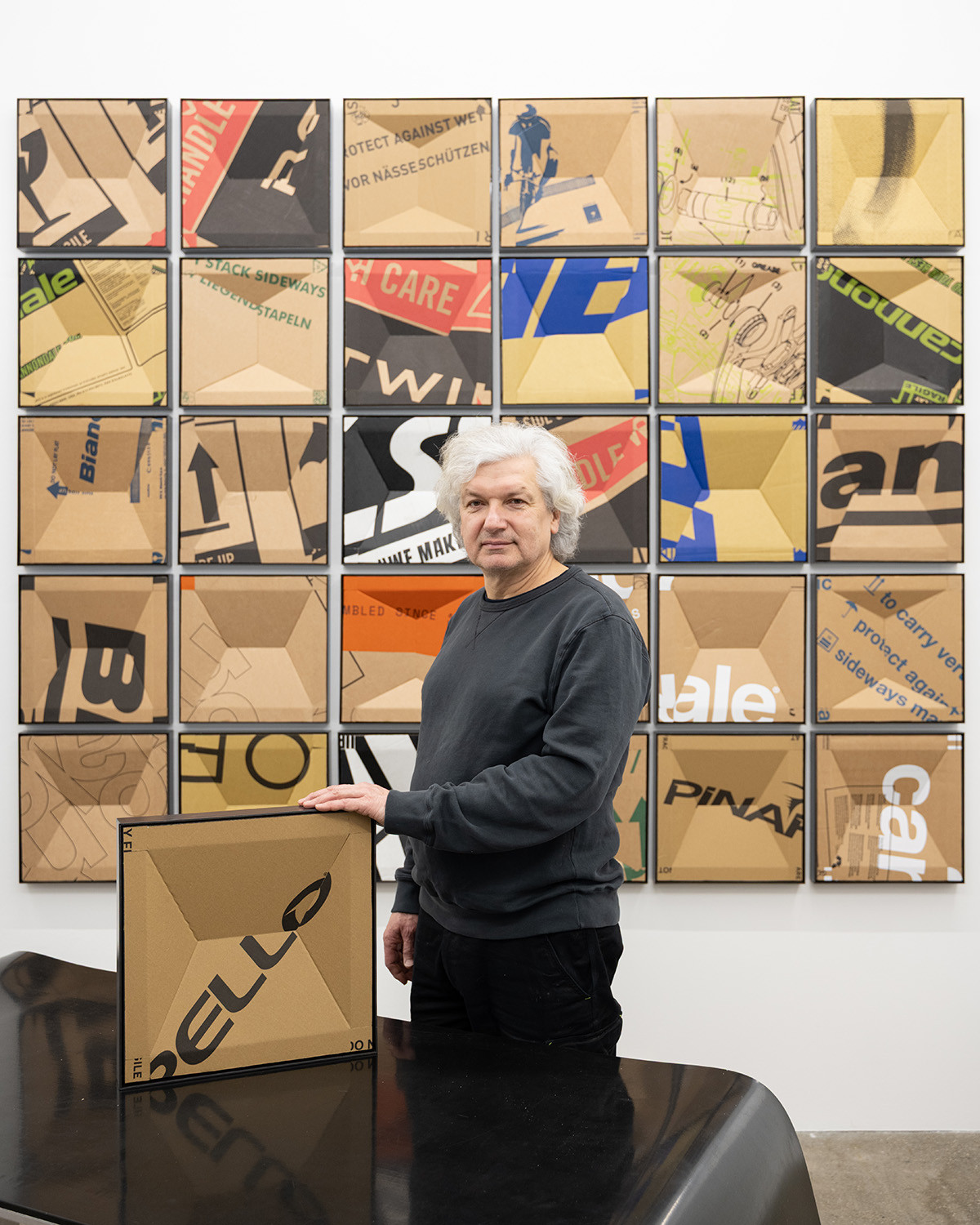 The artist with his works.