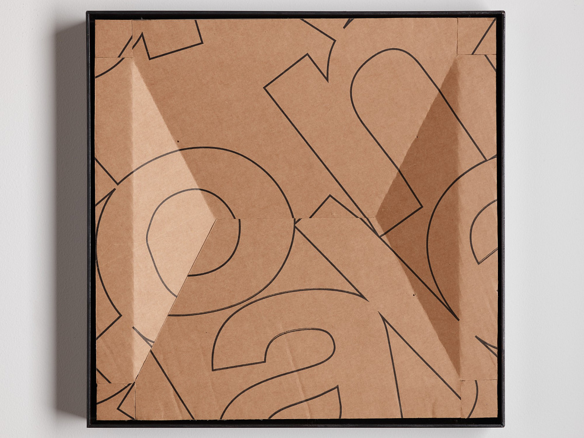 Square cardboard box with colorful print