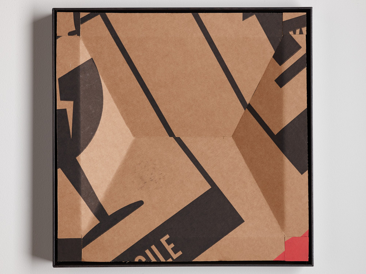 Square cardboard box with colorful print