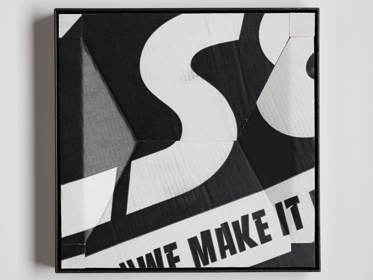 Square cardboard box with colorful print