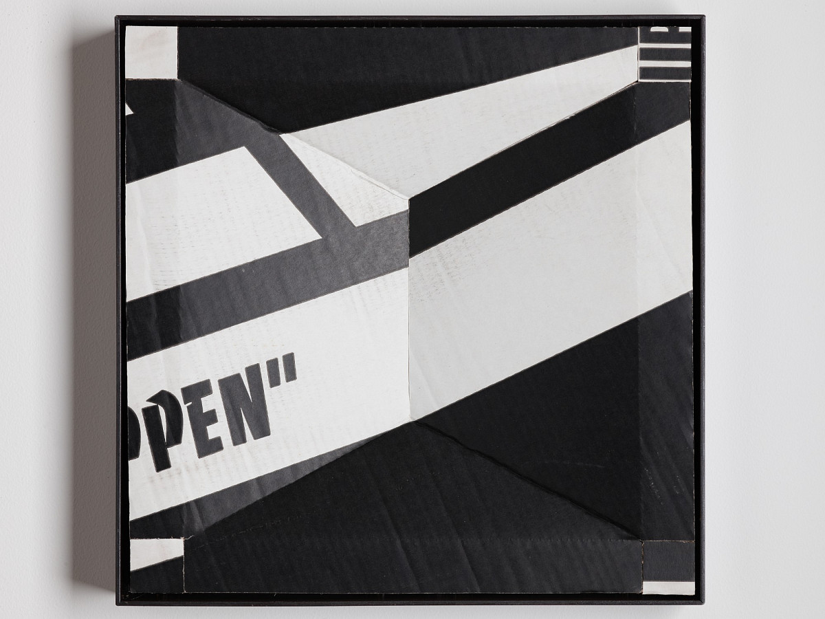 Square cardboard box with colorful print