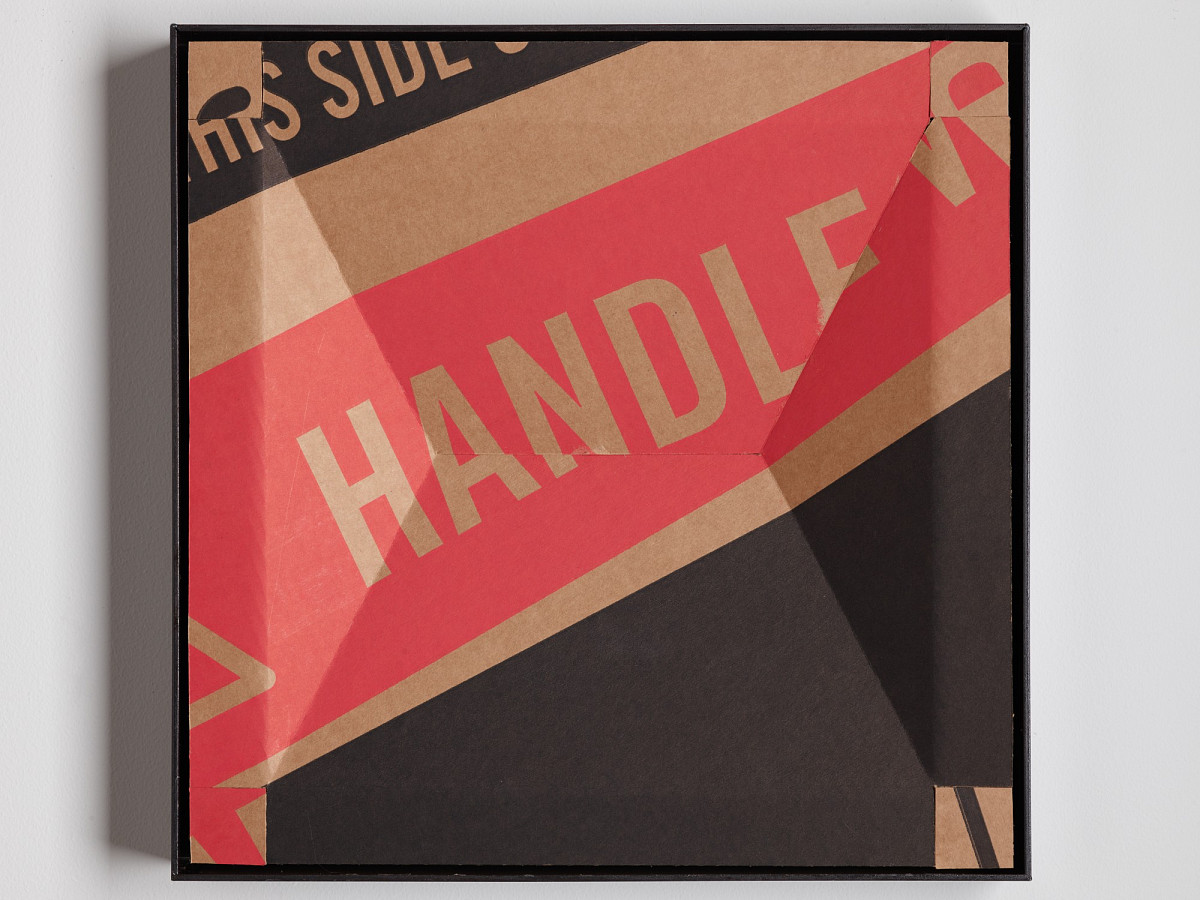 Square cardboard box with colorful print