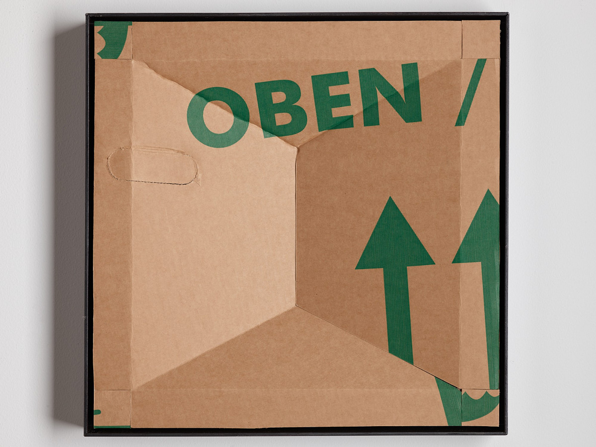Square cardboard box with colorful print