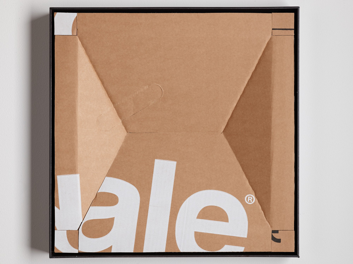 Square cardboard box with colorful print