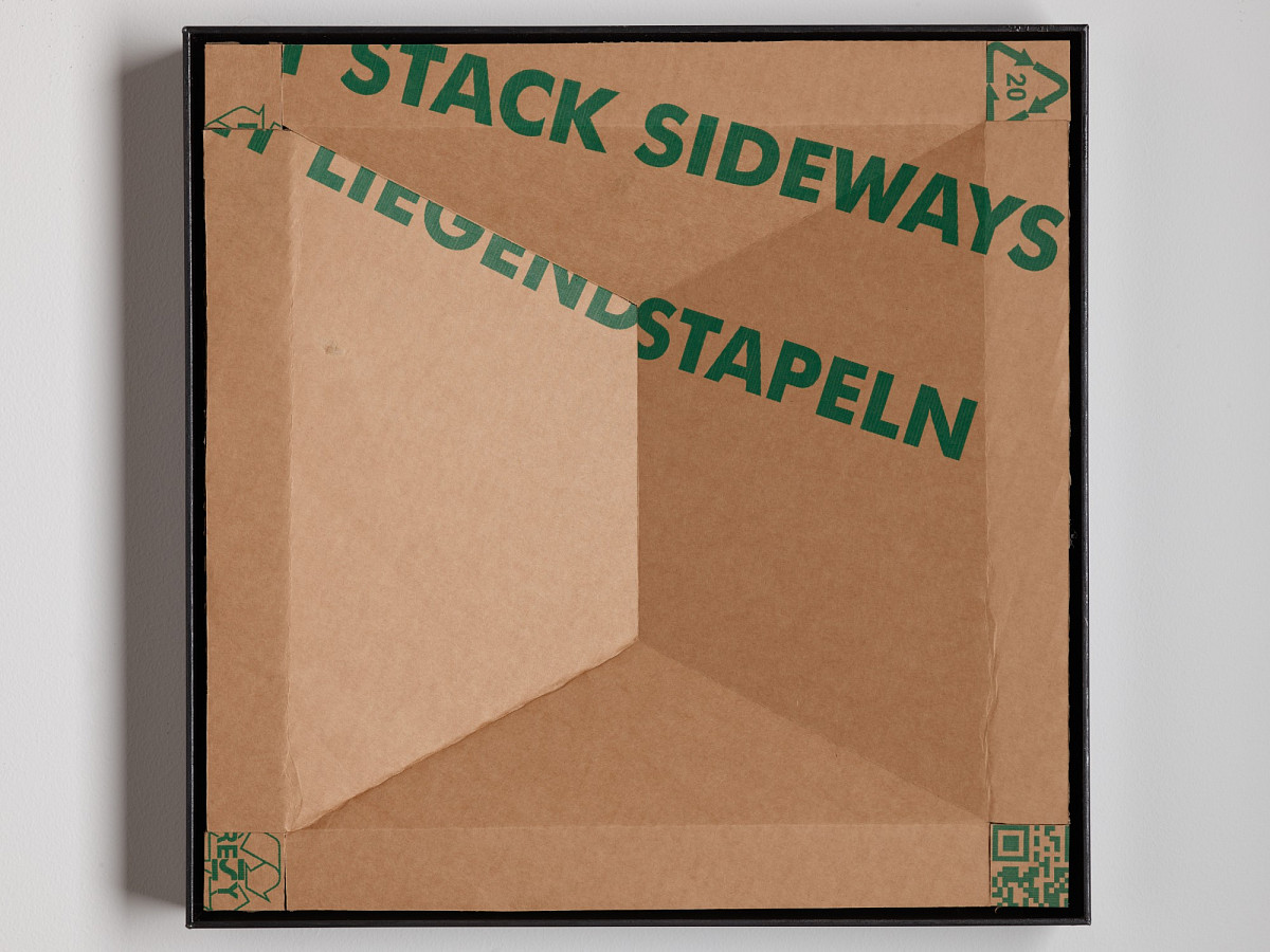 Square cardboard box with colorful print