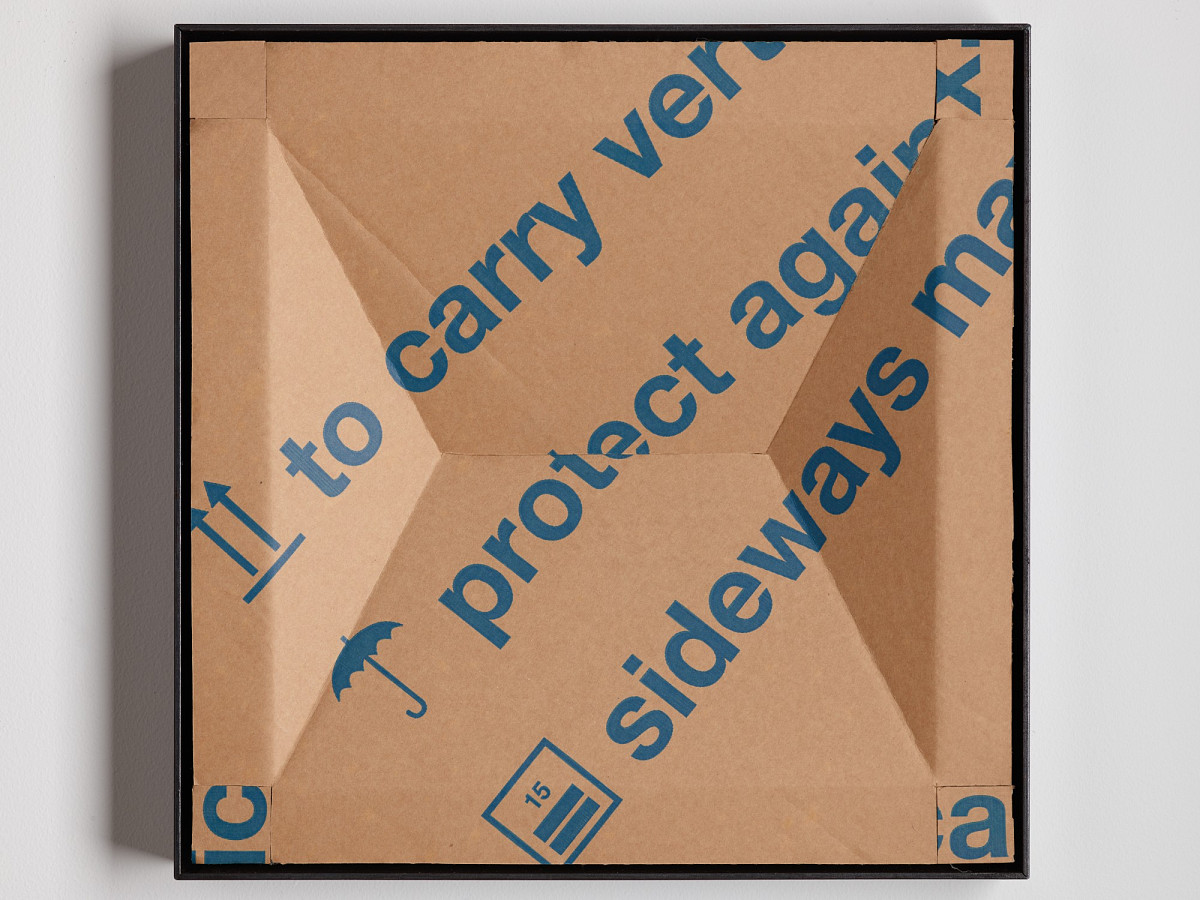 Square cardboard box with colorful print