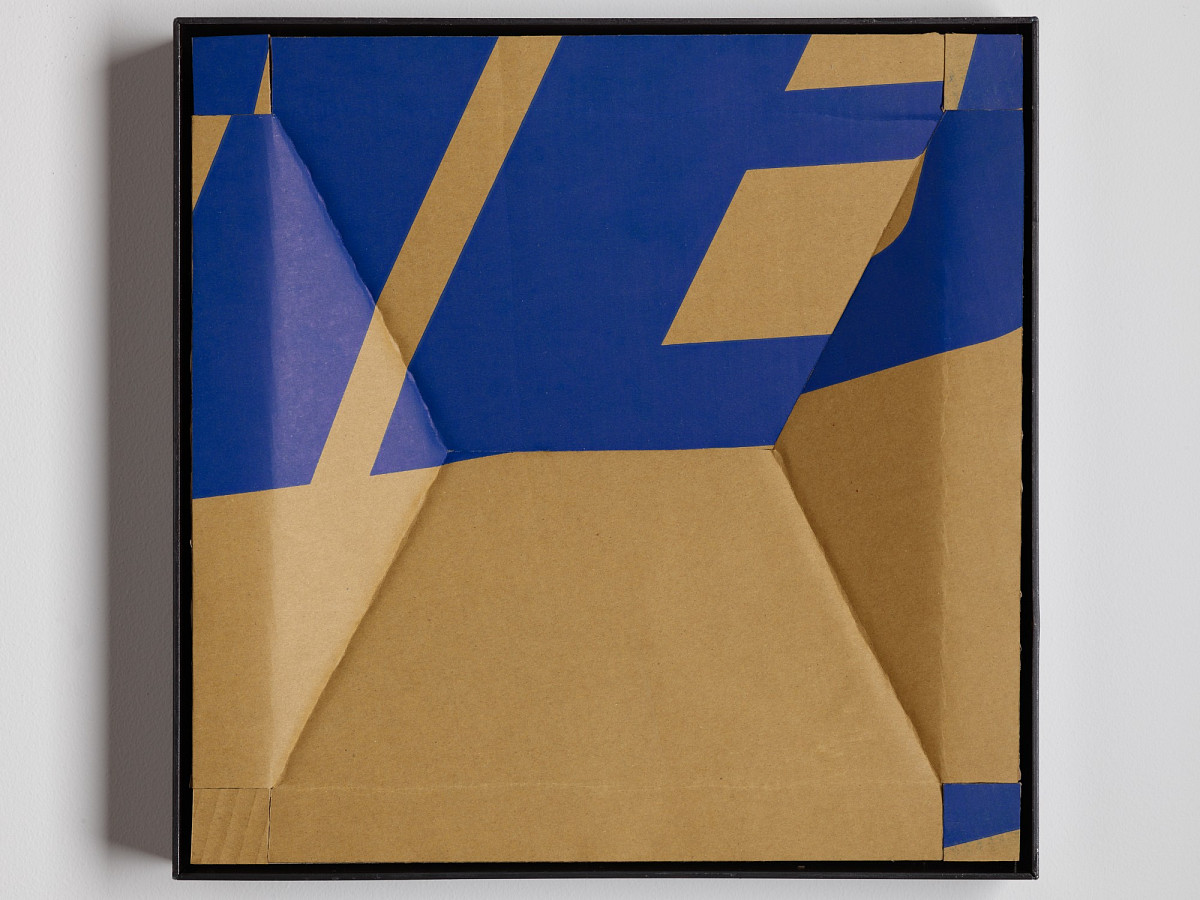 Square cardboard box with colorful print